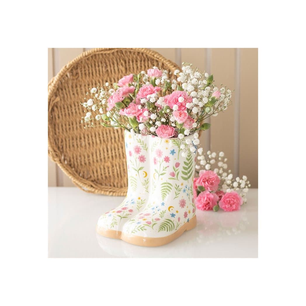 Welly boot shaped plant pot in a floral print, a light green and a dark green design