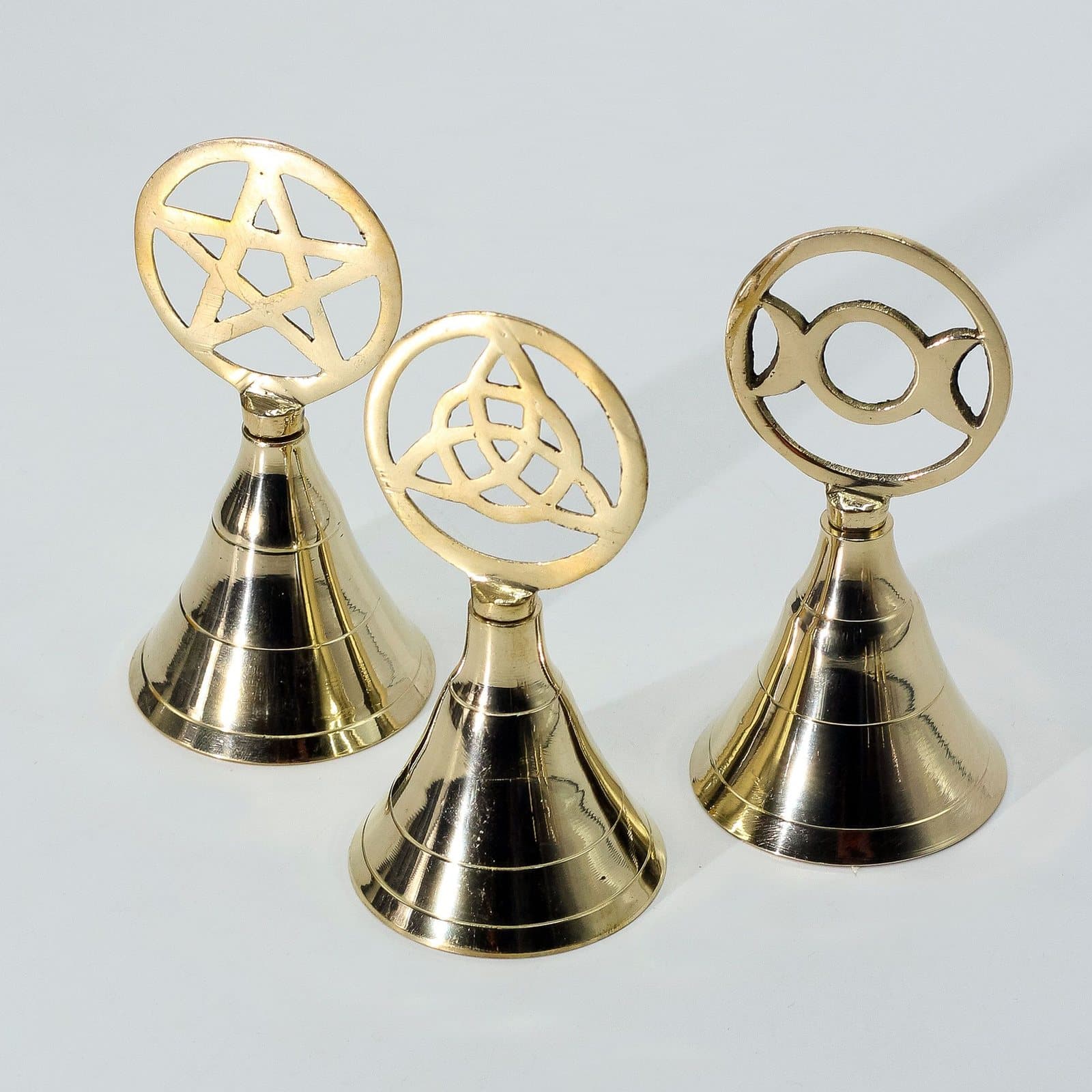 Solid brass altar bell topped with a Triquetra symbol
