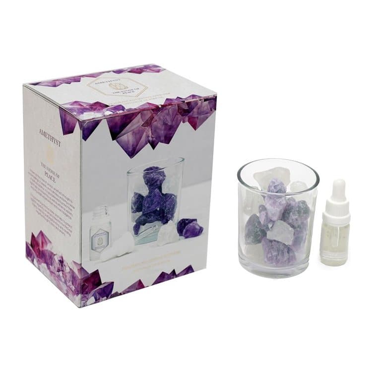 Glass jar of amethyst crystals oil diffuser