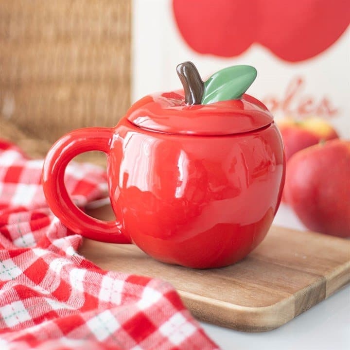 Ceramic apple-shaped mug with a lid