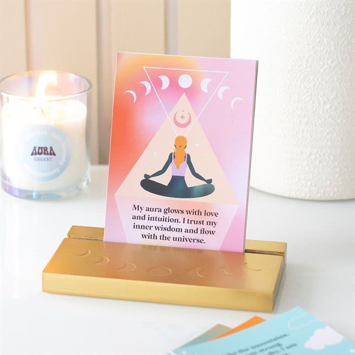 Aura affirmation cards on a gold stand
