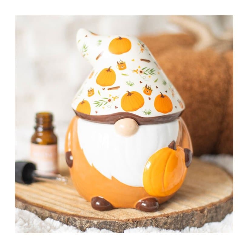 Ceramic gonk oil burner with a pumpkin print hat