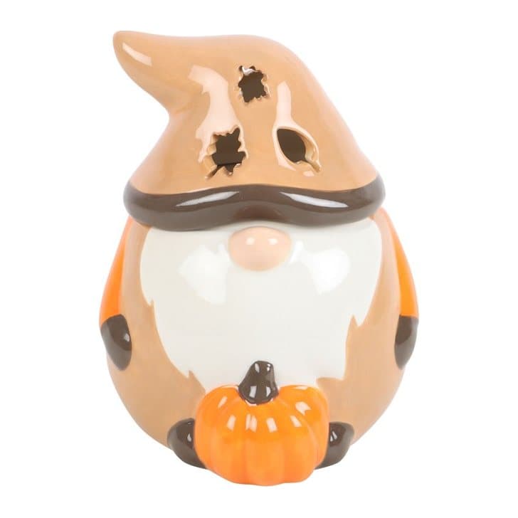 Ceramic autumn gonk oil burner with leaf cut-outs in the hat