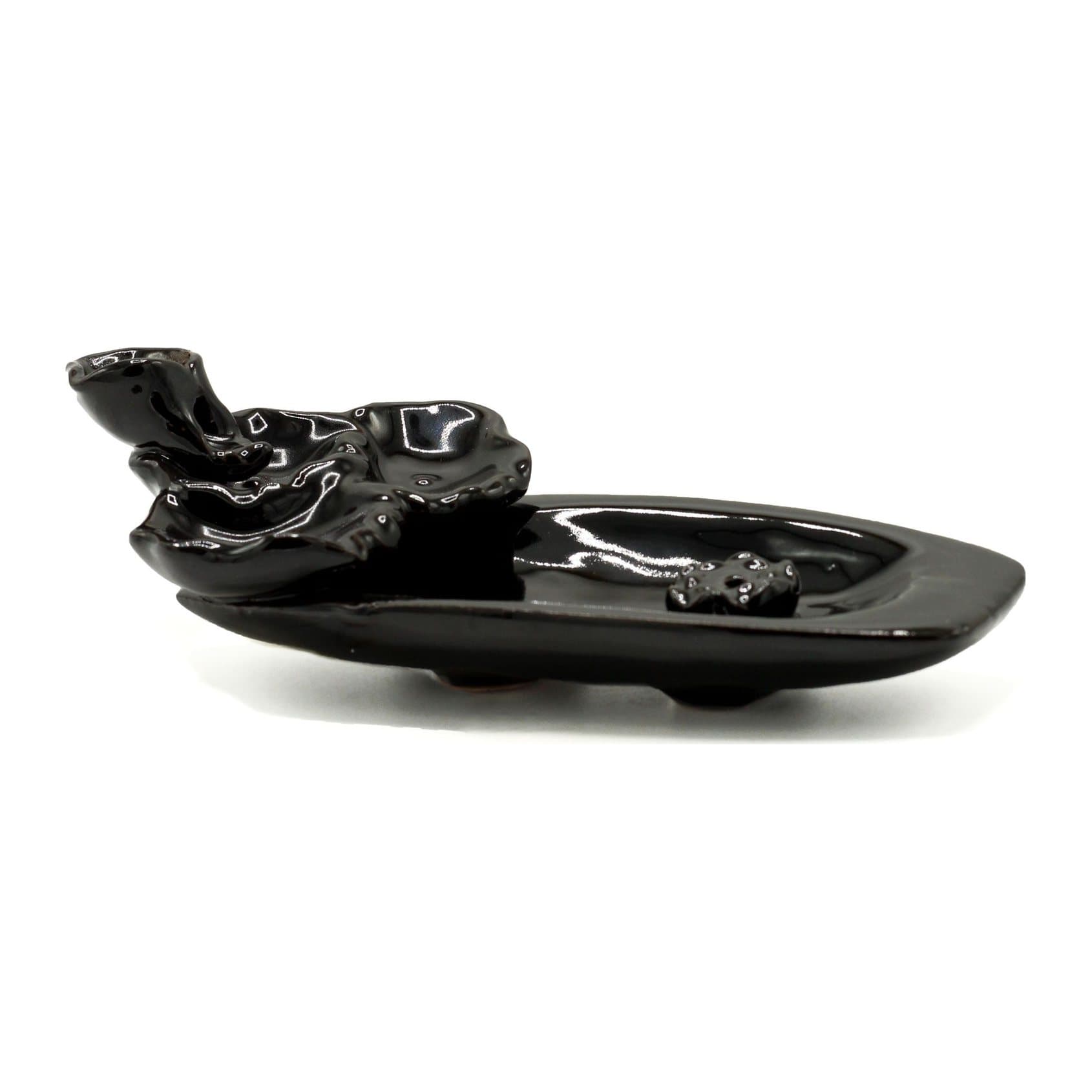 Ceramic backflow incense burner with flowing smoke
