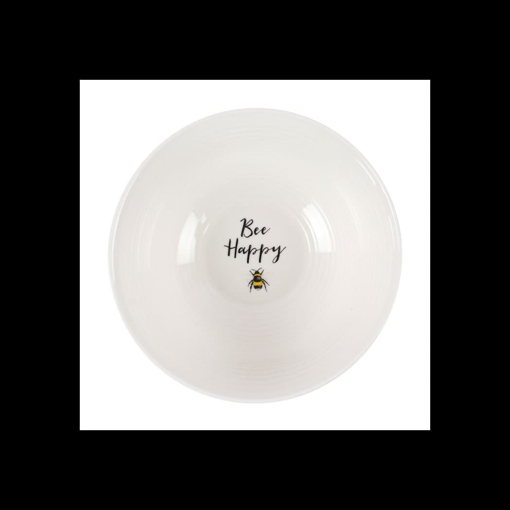 White ceramic bowl with a ridged texture and a Bee Happy design