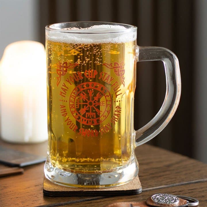 Glass beer tankard with a Viking compass design on a matching cork coaster