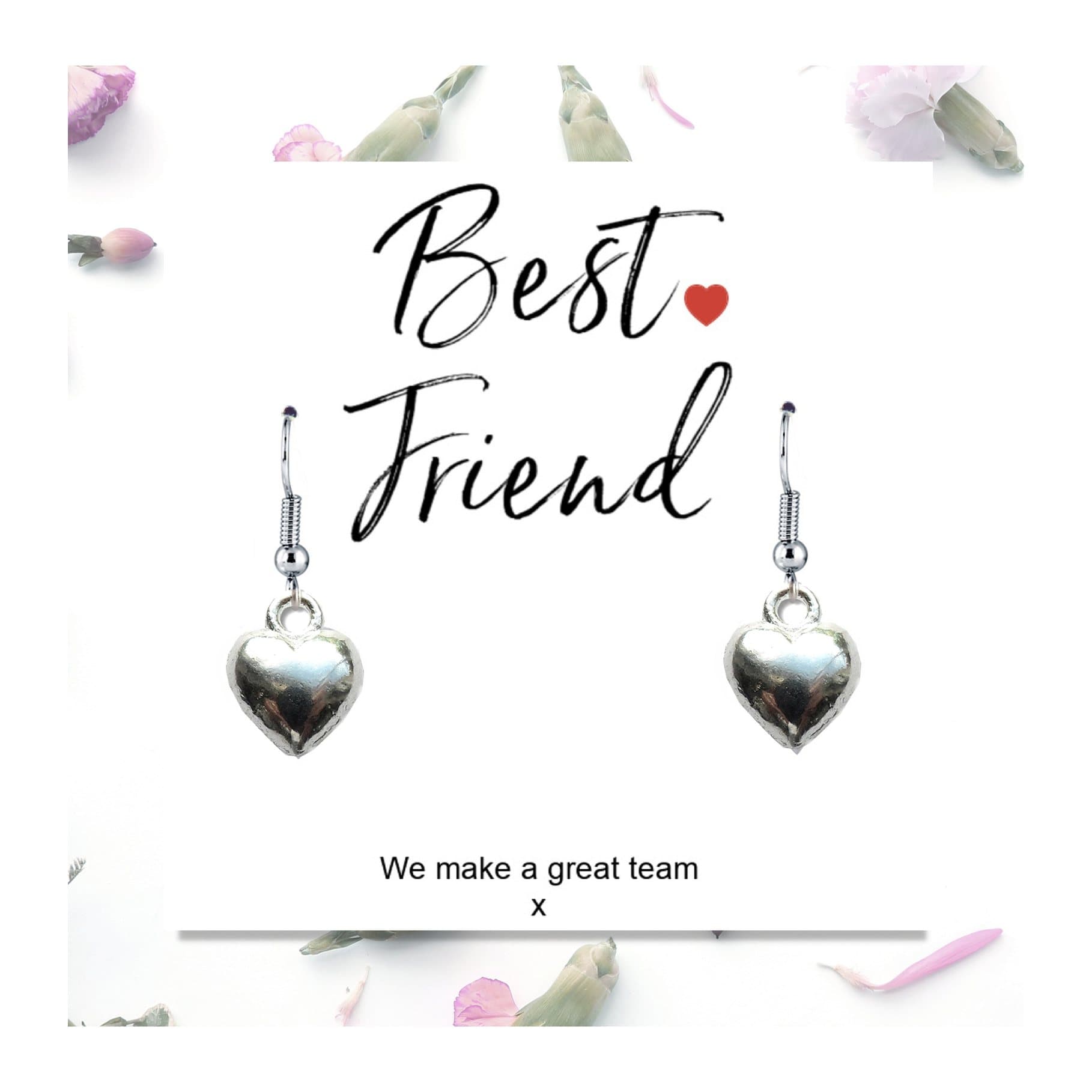 Silver heart charm earrings on a card reading We make a great team