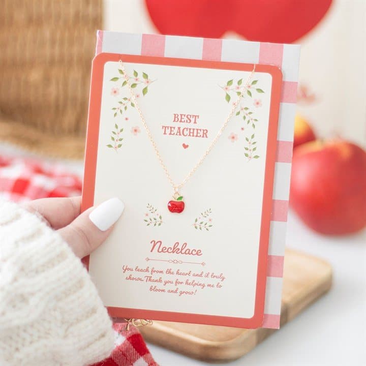 Apple necklace on a Best Teacher card