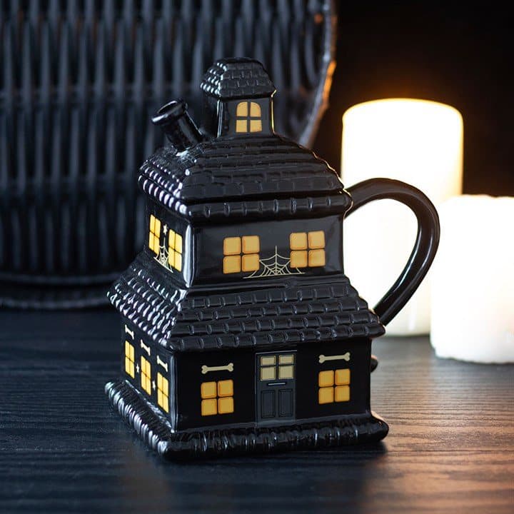 Black haunted house mug