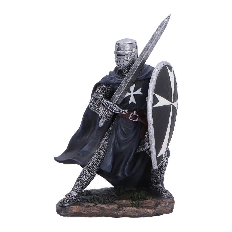Black knight figurine with silver armour, a flowing cape and a sword and shield
