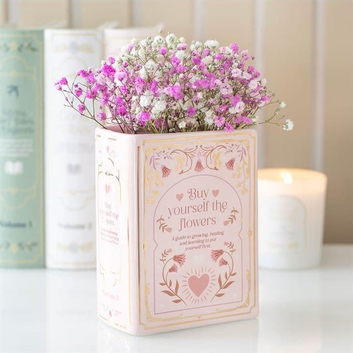 Ceramic book shaped vase standing upright, available in pink, green or white
