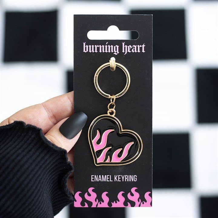 Alloy flaming heart keyring on a cardboard back