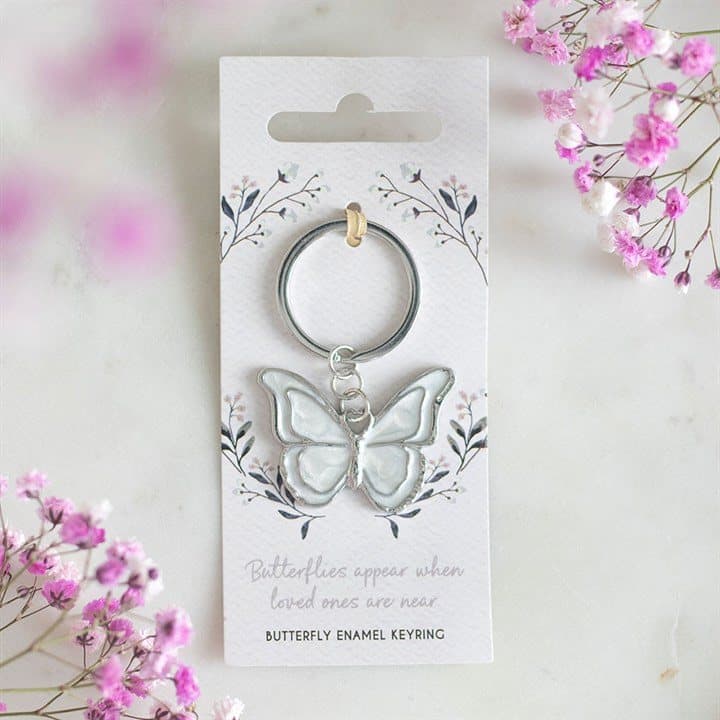 Enamel butterfly keyring on a backing card with a message