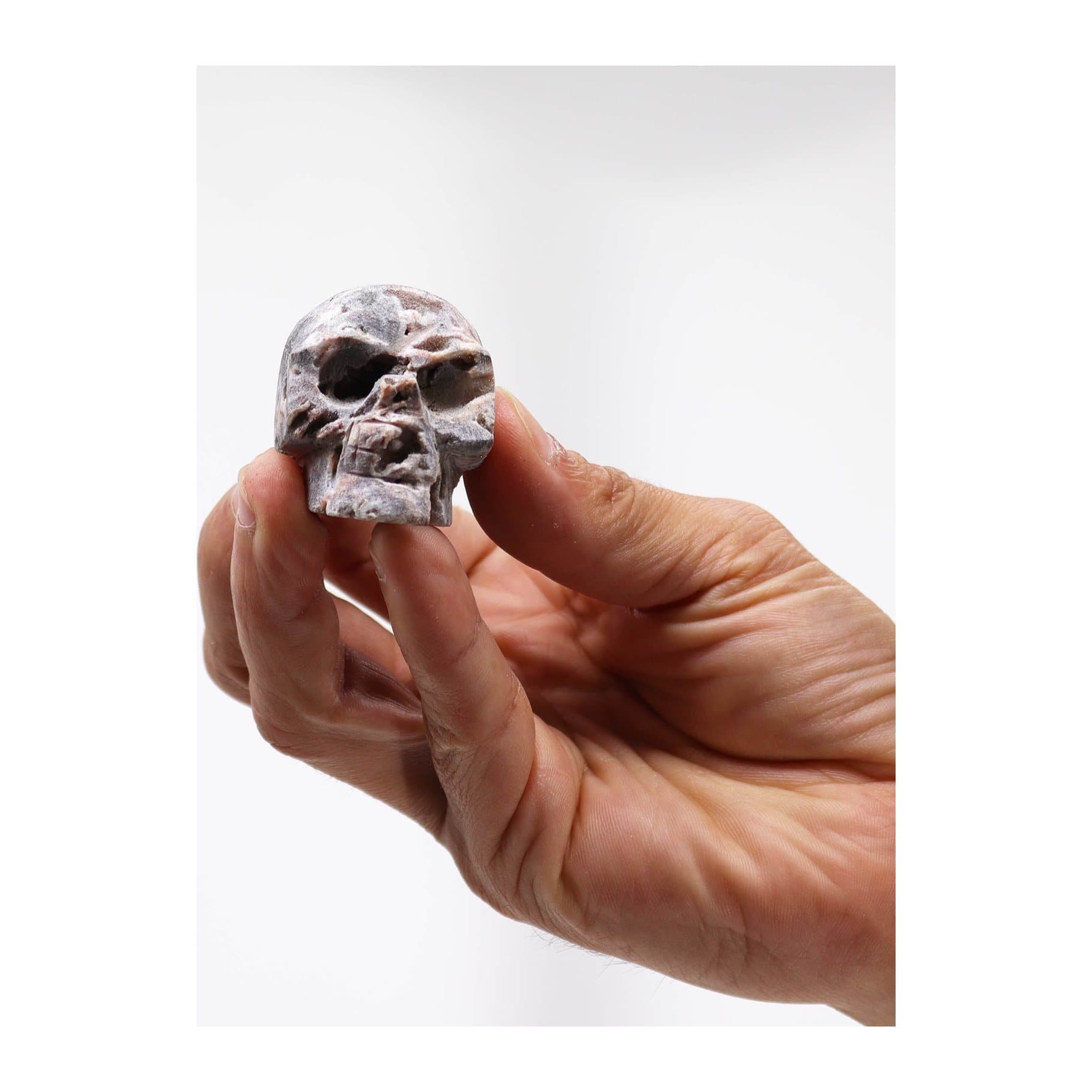 Carved calcite geode skull