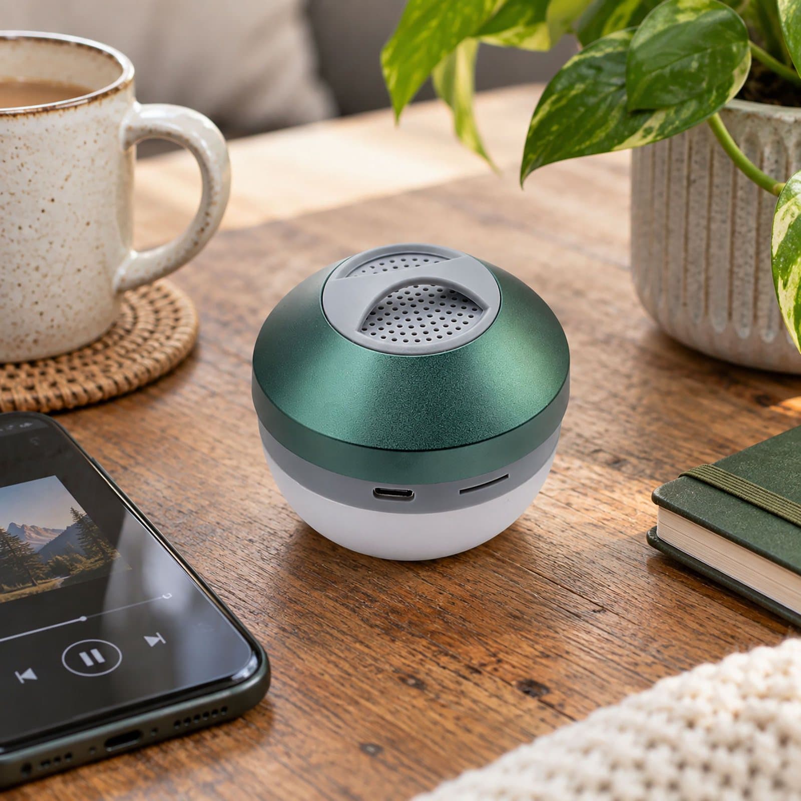 Green camping light with a built-in speaker