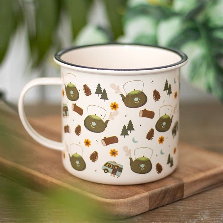 Enamel mug with a woodland camping pattern of trees, kettles and caravans