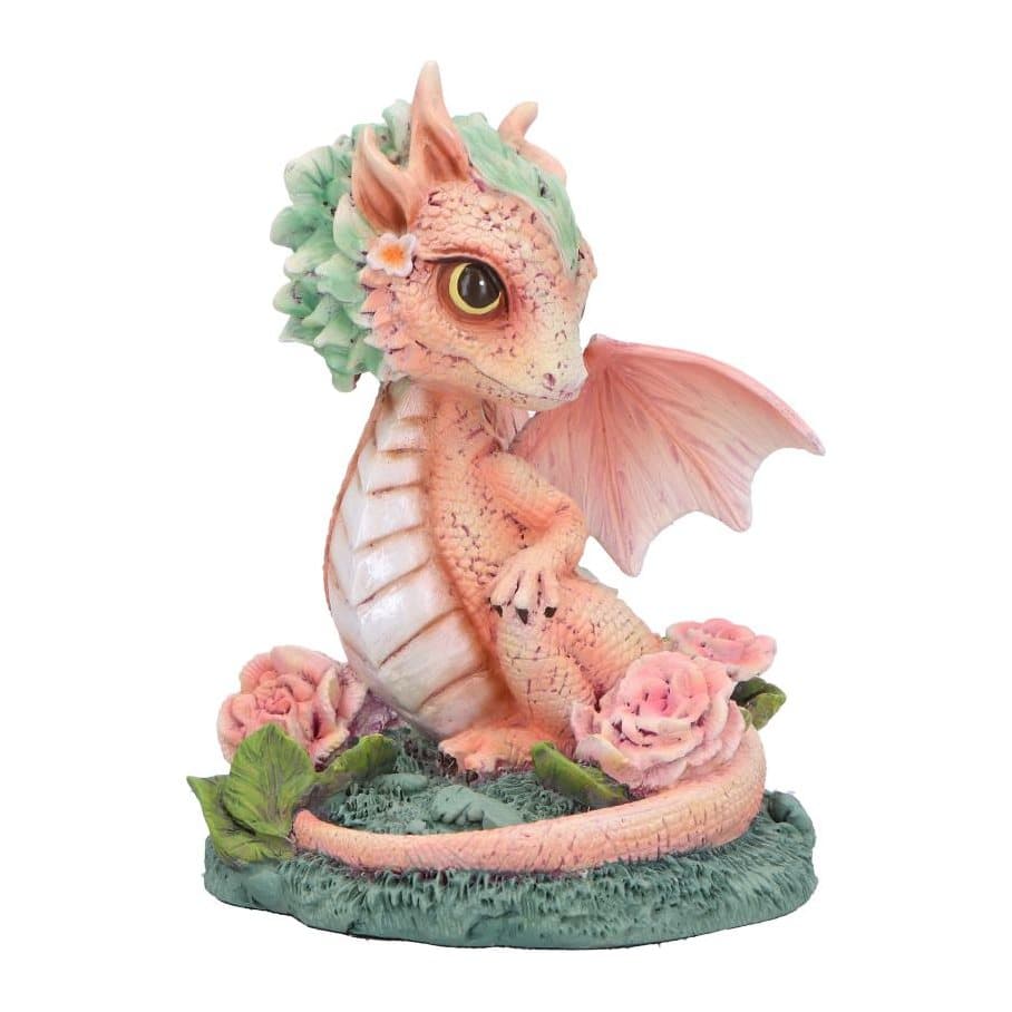 Peach-pink dragon figurine with a mint-green crest and pink carnation flowers