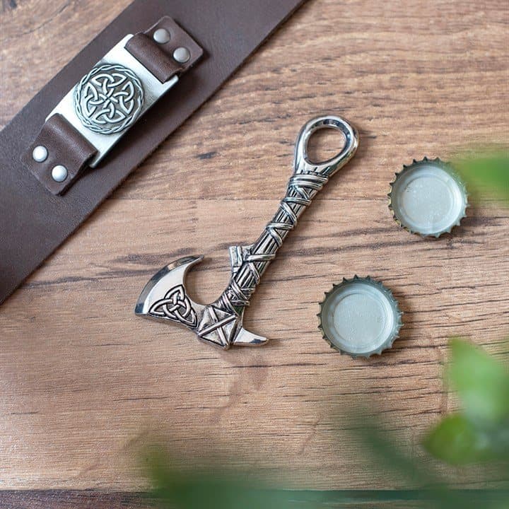 Metal axe-shaped bottle opener with Celtic knotwork