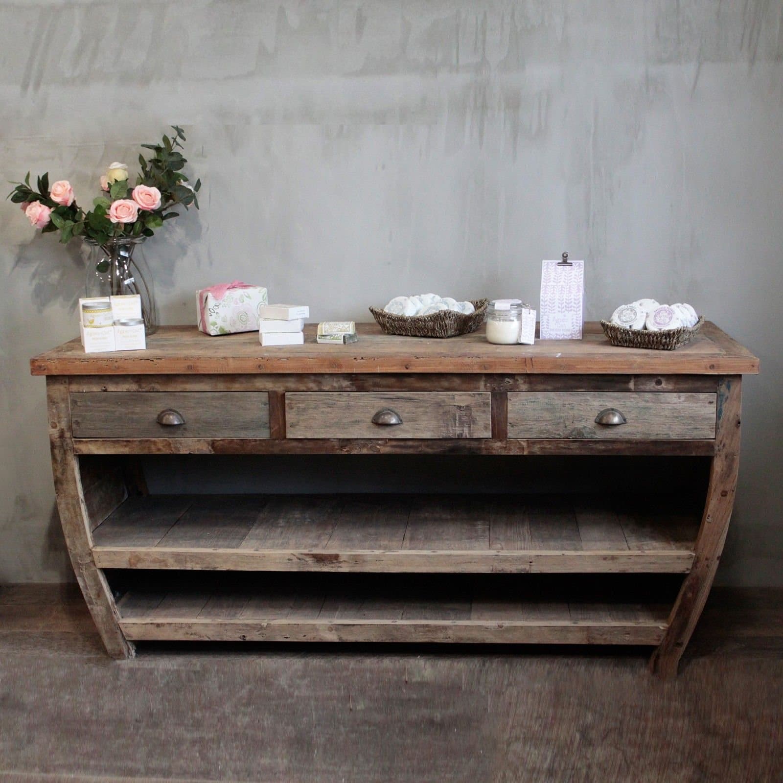 Recycled wood table with three drawers and two long shelves