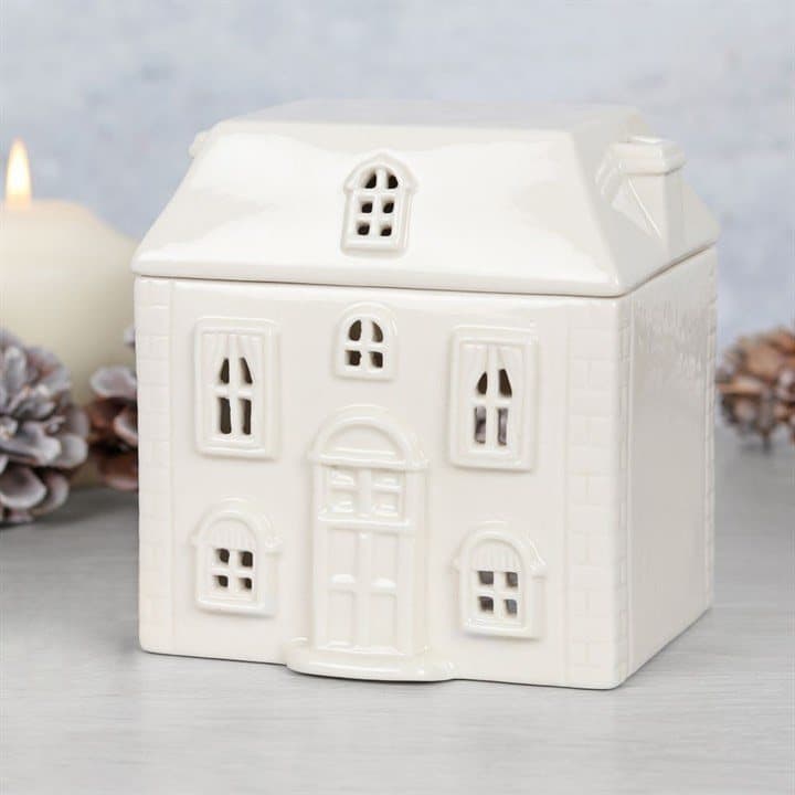 White ceramic house shaped oil burner