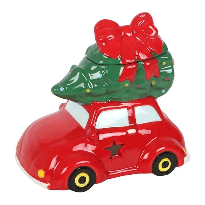 Ceramic red car carrying a Christmas tree, an oil burner