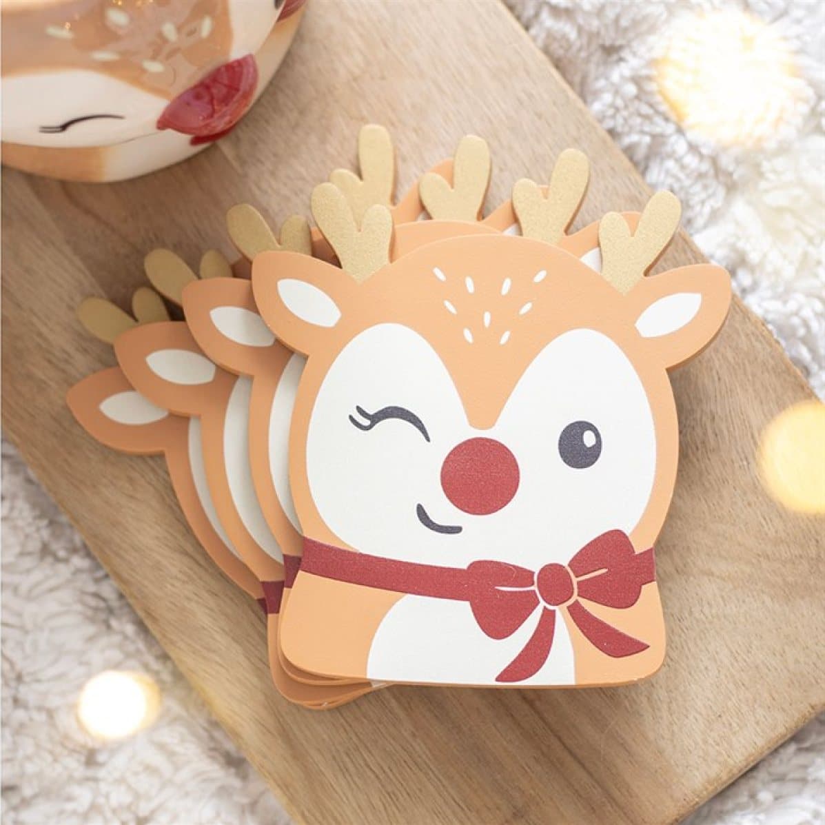 Set of four Christmas MDF coasters with festive character designs