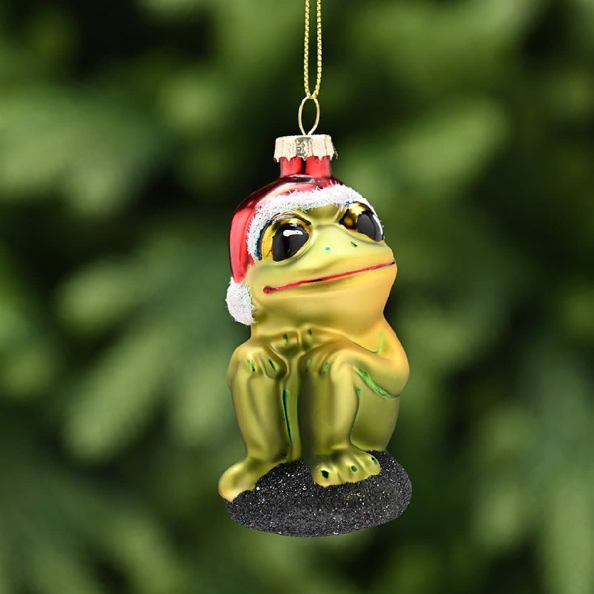 Glass frog Christmas decoration in a red hat