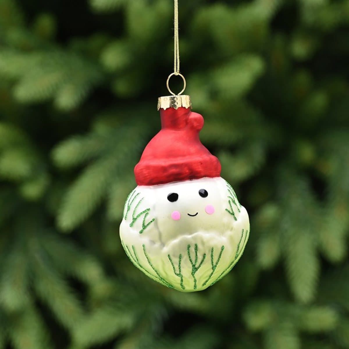 Glass sprout Christmas decoration wearing a red hat