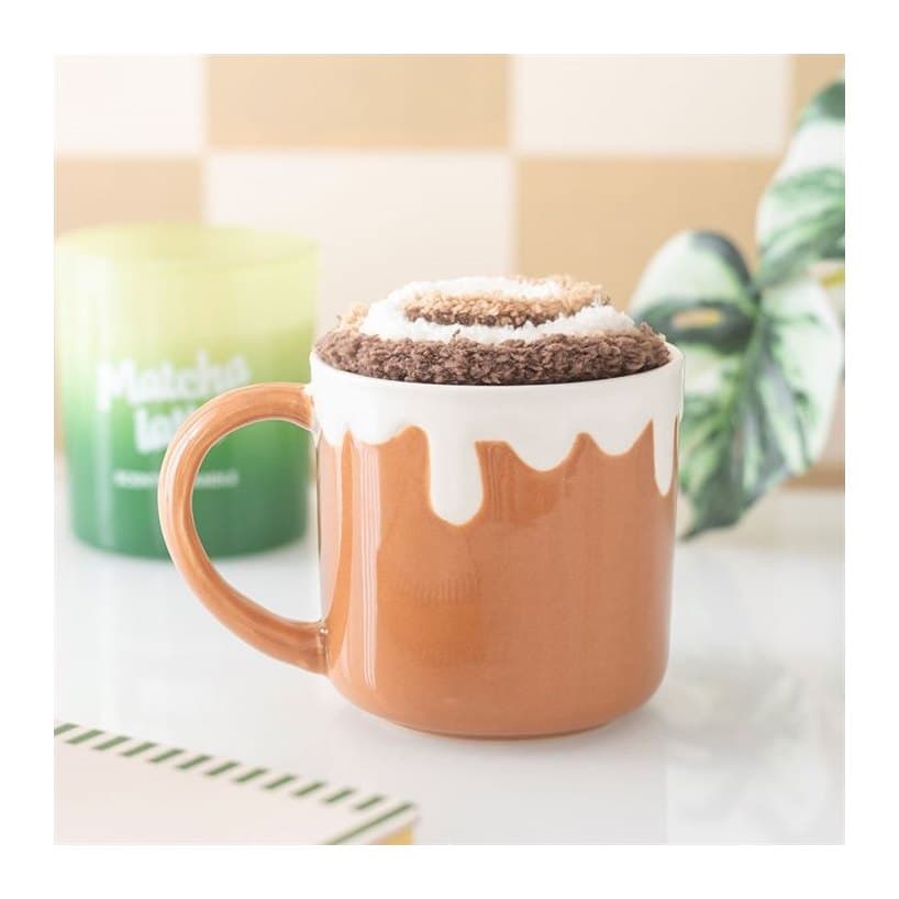 Cinnamon roll ceramic mug with matching plush socks and a colour cardboard box
