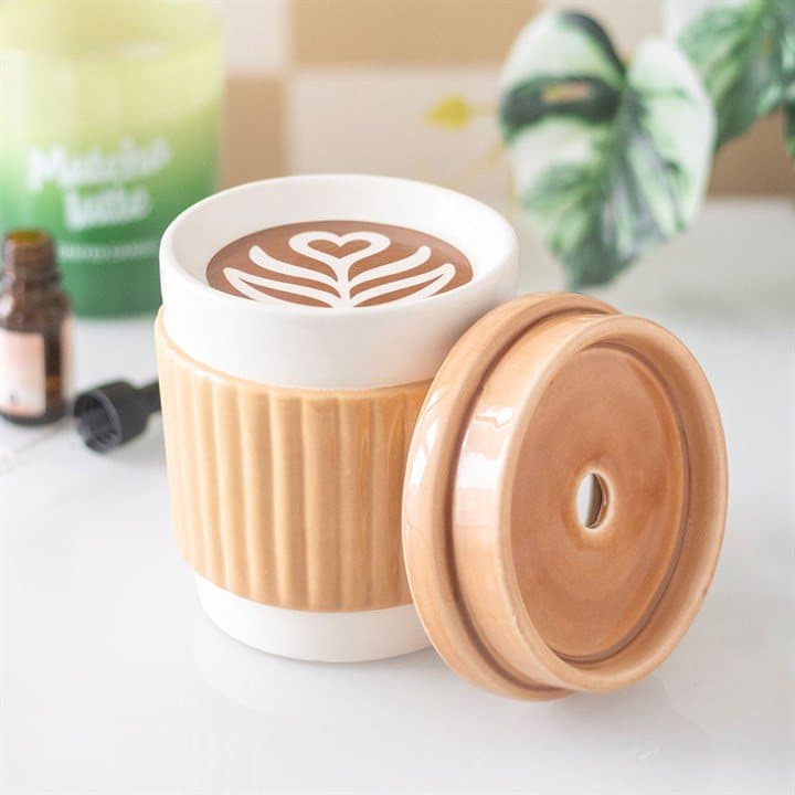 Ceramic oil burner shaped like a coffee cup with a lid