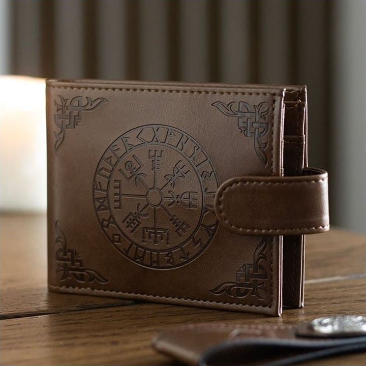 Brown faux leather wallet with an embossed Viking Vegvisir compass on the front