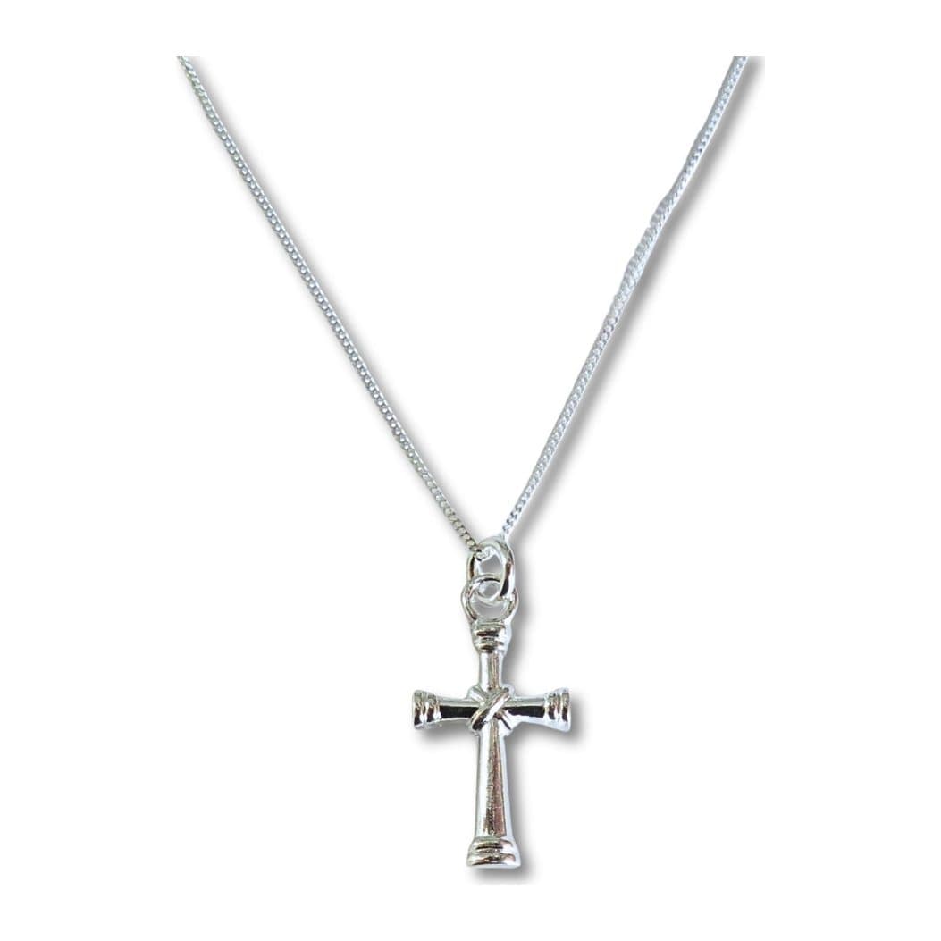 Silver cross charm on a silver chain