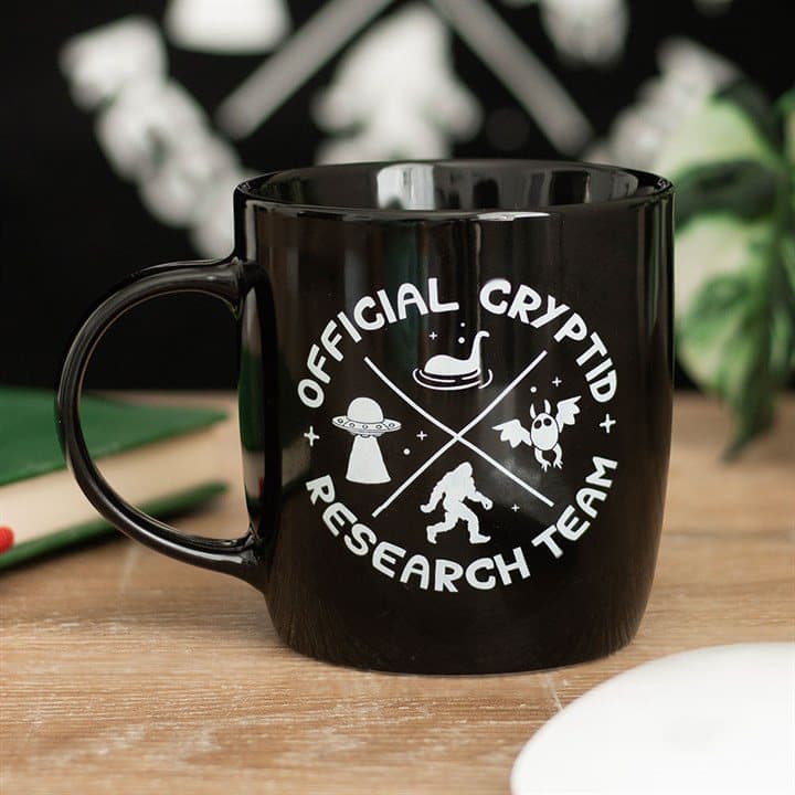 Ceramic mug with cryptid design and Official Cryptid Research Team text