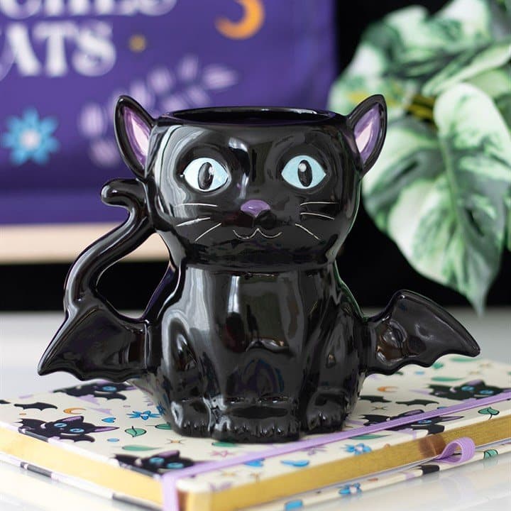 Black cat-shaped mug with tiny bat wings