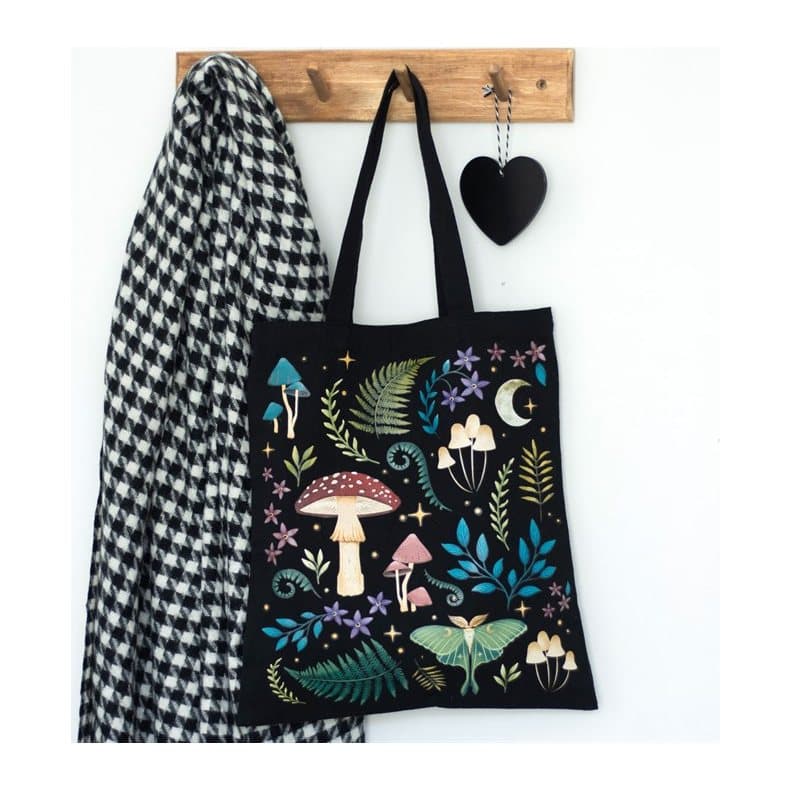 Black tote bag printed with mushrooms and a luna moth