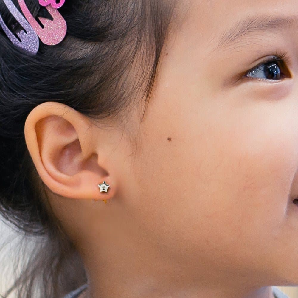 Sterling silver star stud earrings with a diamanté centre