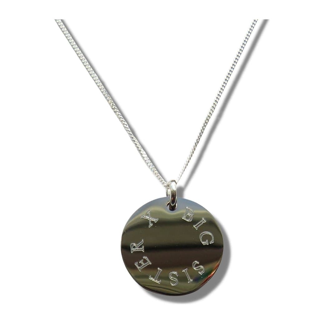 Engraved necklace with a BIG SISTER X charm disc on a silver chain
