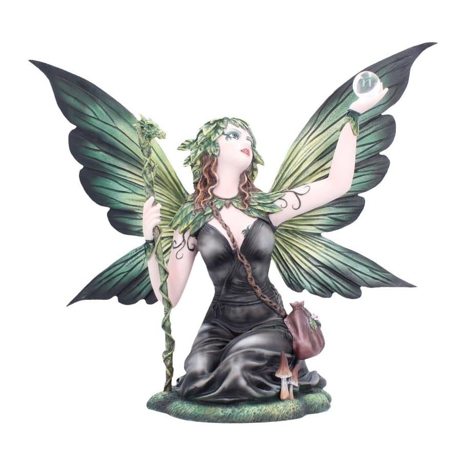 Gothic fairy figurine kneeling on a green mushroom base, with black and green wings
