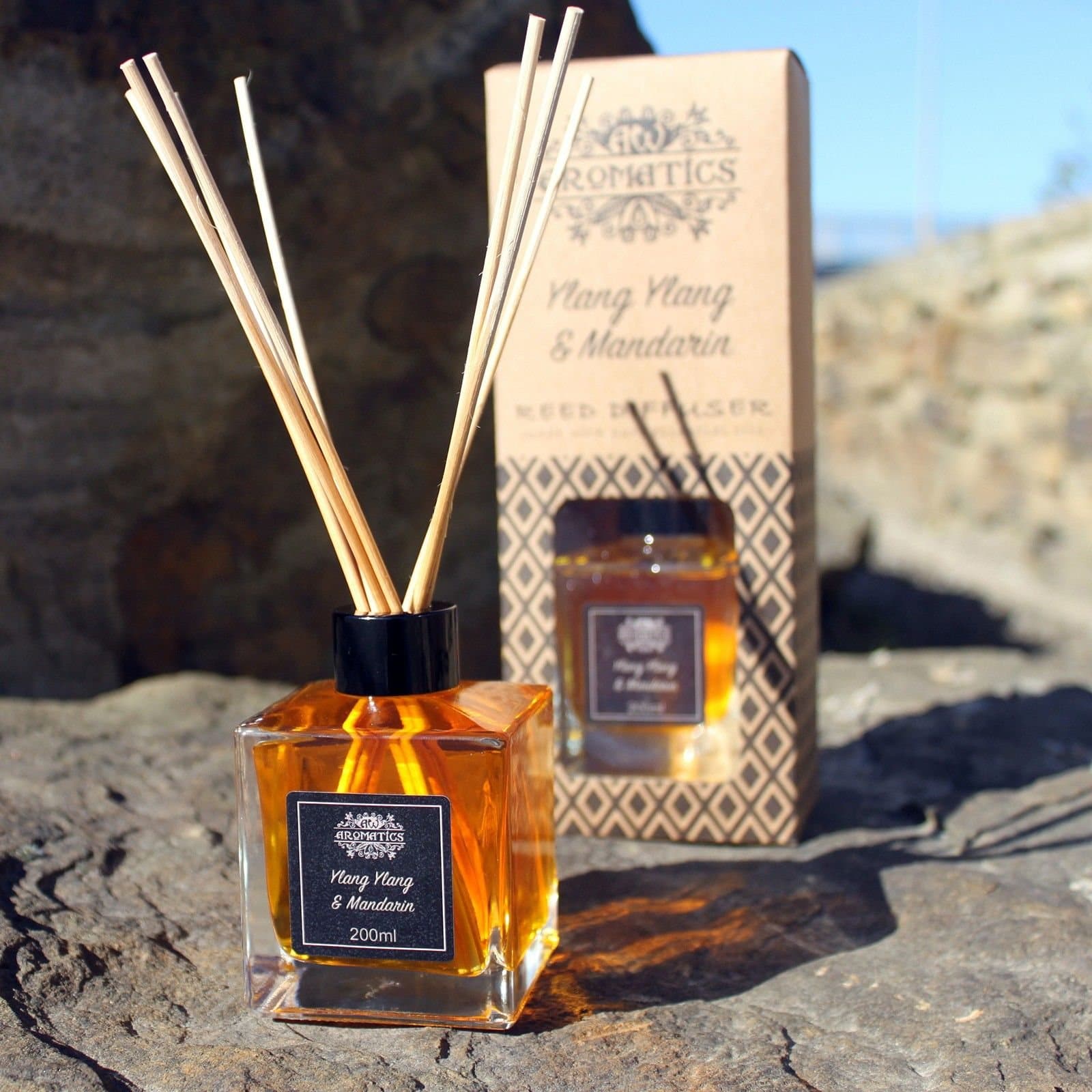 Glass bottle essential oil reed diffuser with rattan reeds in the neck