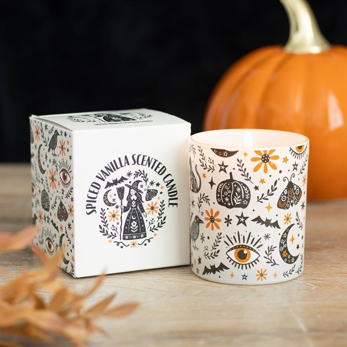 Glass jar candle with a folk-inspired print