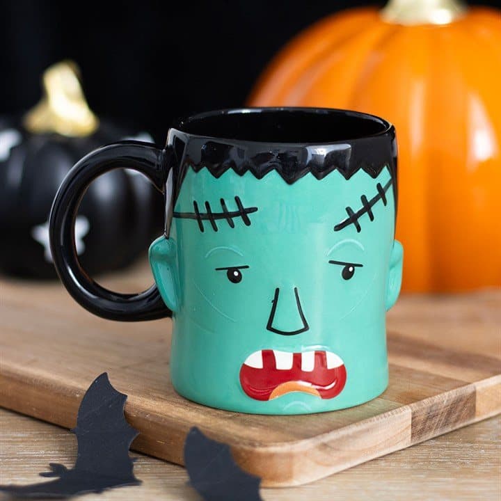Grumpy ceramic monster head mug