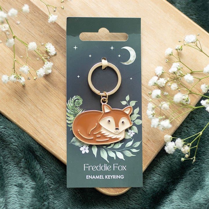 Freddie Fox enamel fox keyring on a cardboard backing card