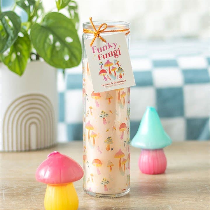 Tall tube candle with a colourful mushroom design