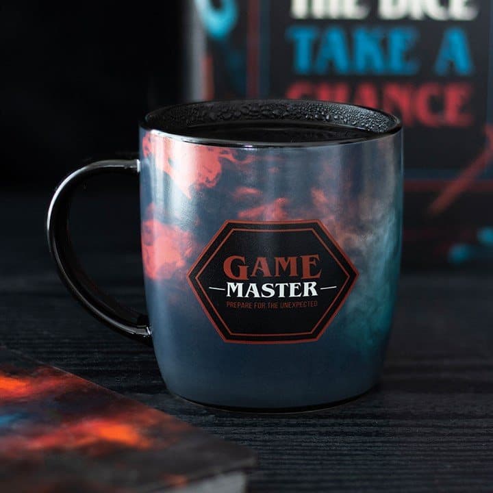 Rounded ceramic mug with red and blue smoke design that changes with heat
