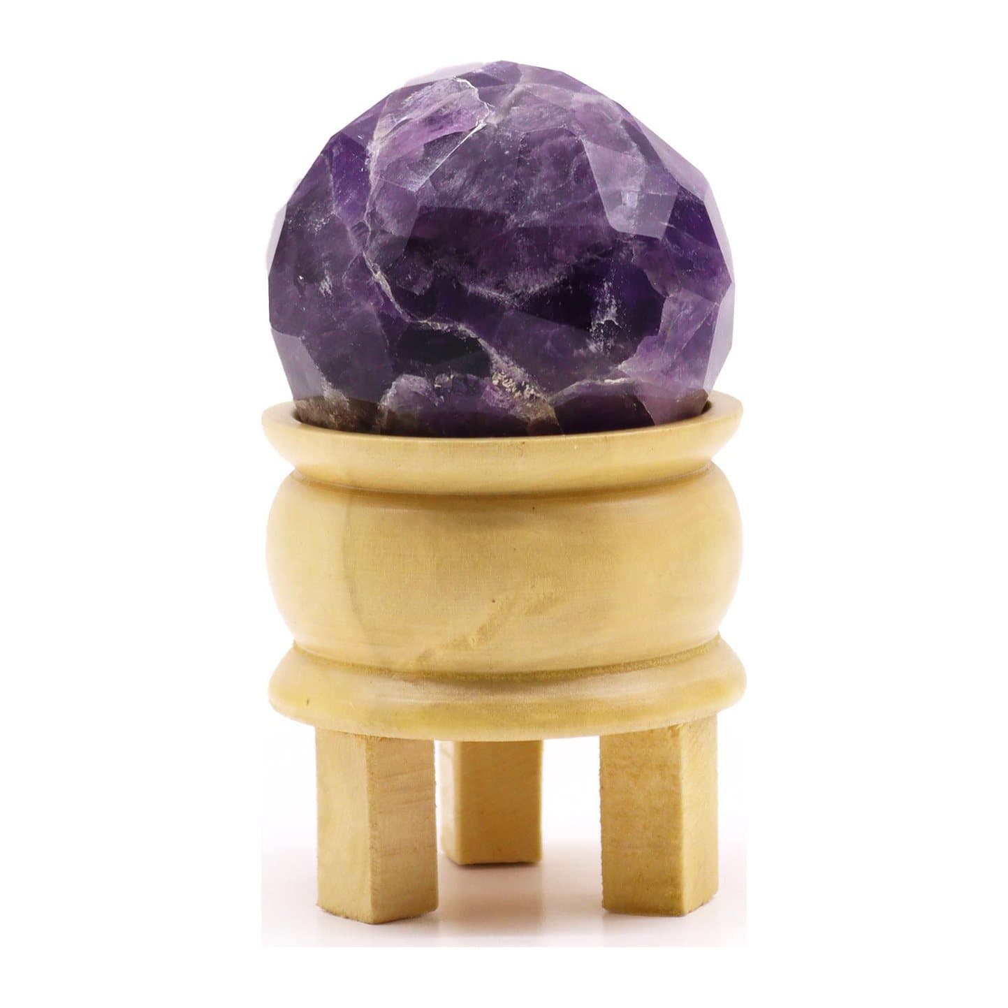 Faceted gemstone ball on a wooden stand