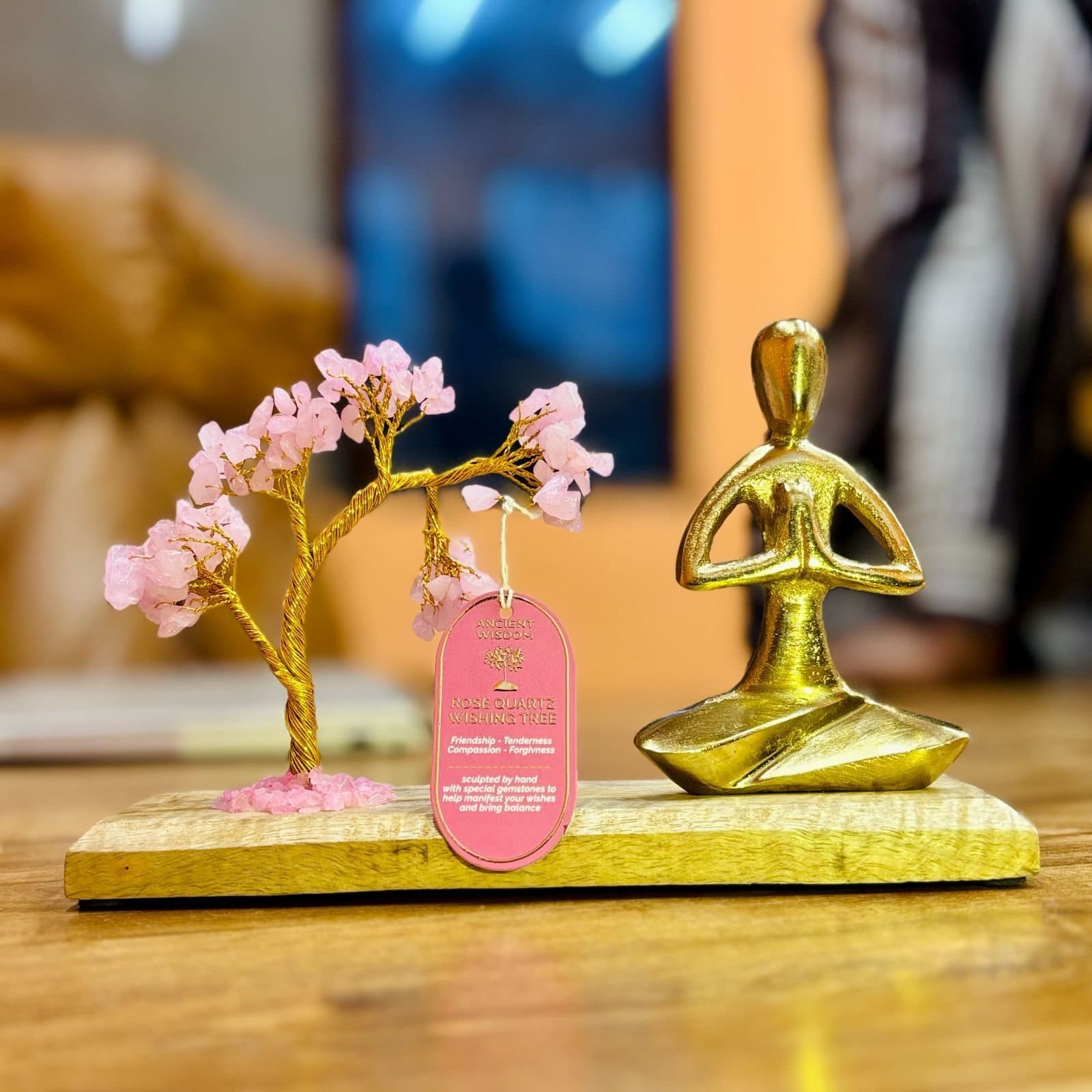 Gemstone tree with a gold yoga figure