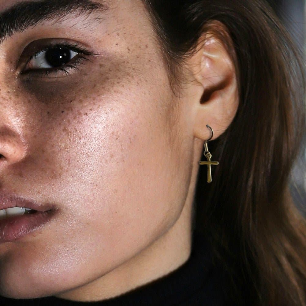 Gold cross drop earrings