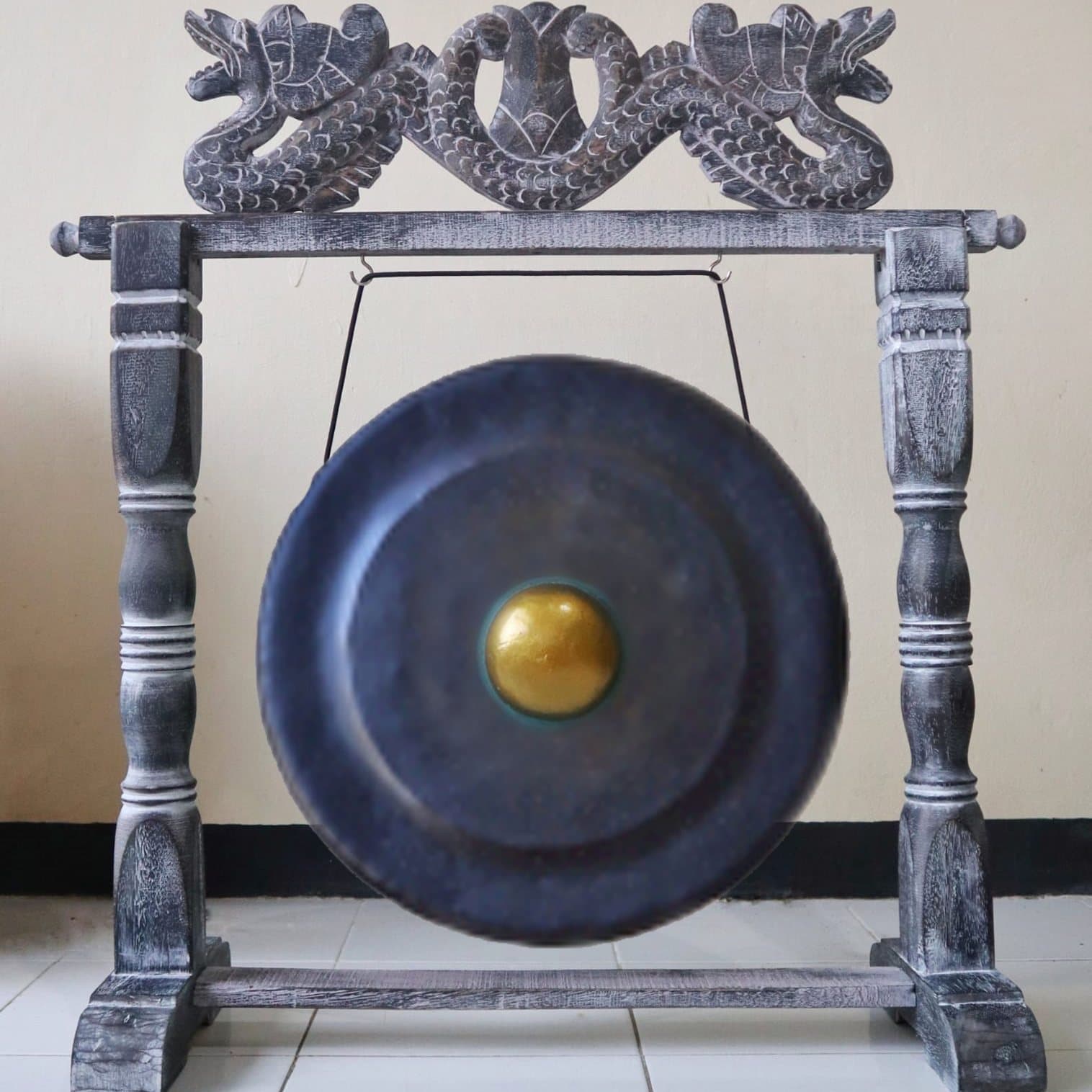 Black gong in a stand