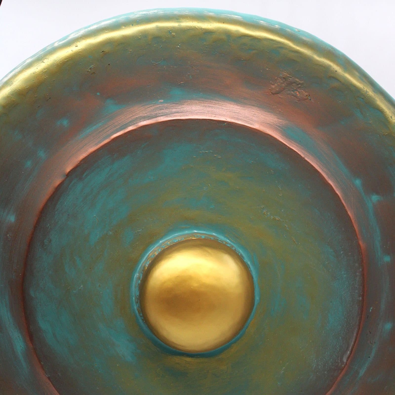Gong hanging in a carved wooden stand