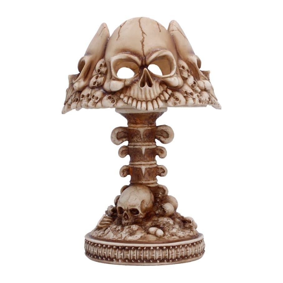Bone-coloured gothic skull lamp with sculpted skulls and a base of bones